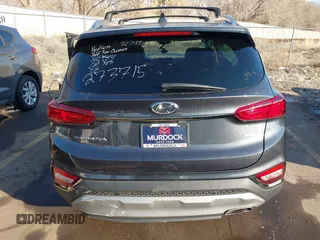 2020 Hyundai Santa Fe Limited with VIN 5NMS5CAD9LH273715, listed as a IAAI auction lot 41259190 with 14,669 mi miles and . Bid and sale history available at DreamBid. Image 15.