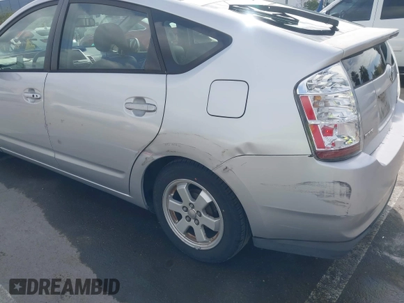 2006 Toyota Prius with VIN JTDKB20U767064148, listed as a IAAI auction lot 41603966 with 275,326 mi miles. Bid and sale history available at carsss.com. Image 6.
