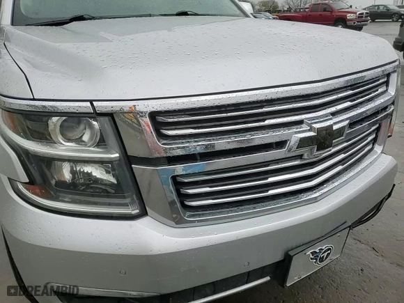 2015 Chevrolet Suburban LTZ with VIN 1GNSCKKCXFR587516, listed as a Copart auction lot 50877665 with 193,618 mi miles and Salvage Title. Bid and sale history available at carsss.com. Image 14.