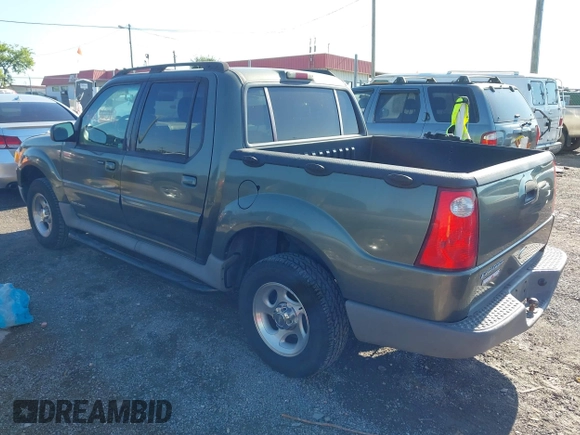 2001 Ford Explorer Sport Trac z VIN 1FMZU67E61UC97894, wystawiony jako IAAI lot #42636012 z przebiegiem 167 633 mil mil oraz . Historia ofert i sprzedaży dostępna na DreamBid. Obrazek 3.