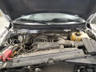2014 Ford F-150 XL with VIN 1FTMF1CM7EKD61547, listed as a Copart auction lot 51966015 with 175,234 mi miles and Salvage Title. Bid and sale history available at carsss.com. Image 11.