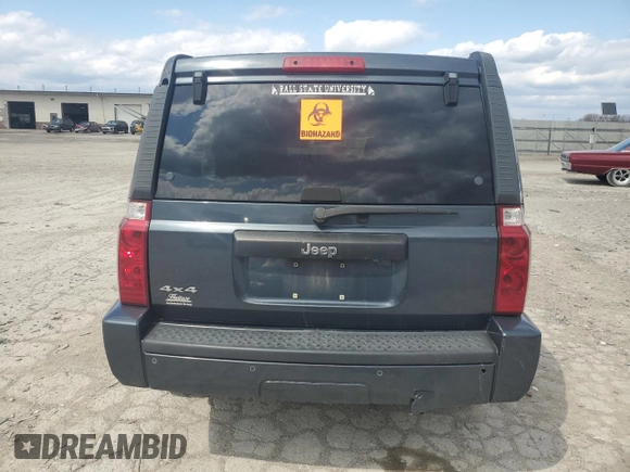 2007 Jeep Commander Sport z VIN 1J8HG48K47C691109, wystawiony jako Copart lot #52138775 z przebiegiem 231 327 mil mil oraz Szkoda całkowita • Salvage title. Historia ofert i sprzedaży dostępna na DreamBid. Obrazek 6.