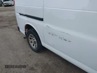 2014 Chevrolet Express Cargo Van with VIN 1GCSGAFX1E1118221, listed as a IAAI auction lot 41832544 with 310,914 mi miles. Bid and sale history available at carsss.com. Image 6.