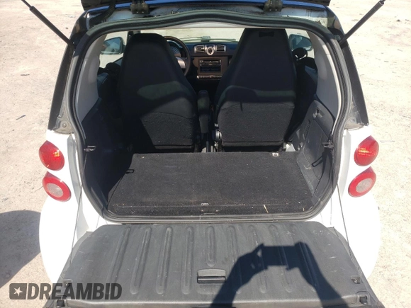 2014 Smart fortwo Pure с VIN WMEEJ3BA0EK780282, выставлен на аукционе Copart как лот 47691815 с пробегом 74 144 миль миль и Чистый • Clean title. История ставок и продаж доступна на DreamBid. Изображение 10.