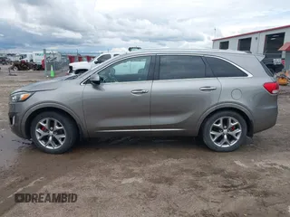 2017 Kia Sorento SXL z VIN 5XYPK4A59HG253995, wystawiony jako IAAI lot #42367134 z przebiegiem 118 084 mil mil oraz . Historia ofert i sprzedaży dostępna na DreamBid. Obrazek 15.