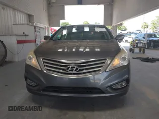 2013 Hyundai Azera with VIN KMHFH4JG3DA213459, listed as a IAAI auction lot 42642239 with 130,195 mi miles and . Bid and sale history available at DreamBid. Image 12.