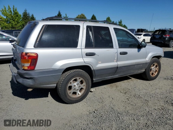 2004 Jeep Grand Cherokee Laredo with VIN 1J4GW48S54C103651, listed as a Copart auction lot 62972615 with 188,000 mi miles and Clean title. Bid and sale history available at DreamBid. Image 3.