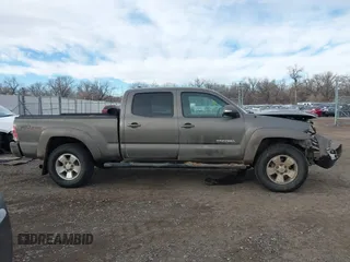2014 Toyota Tacoma with VIN 3TMMU4FN7EM067182, listed as a IAAI auction lot 41108551 with 156,398 mi miles and . Bid and sale history available at DreamBid. Image 13.