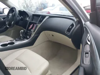 2015 Infiniti Q50 Premium z VIN JN1BV7AR8FM390785, wystawiony jako IAAI lot #42200437 z przebiegiem 94 841 mil mil oraz . Historia ofert i sprzedaży dostępna na DreamBid. Obrazek 5.