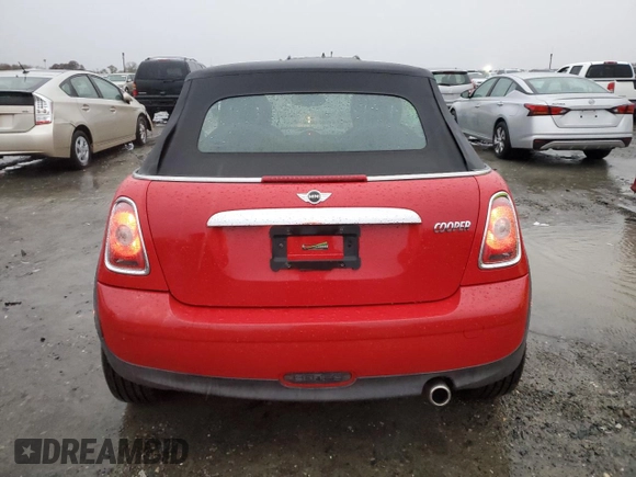 2009 MINI Convertible with VIN WMWMR33539TU96291, listed as a Copart auction lot 83849744 with 65,056 mi miles and Salvage title. Bid and sale history available at DreamBid. Image 6.