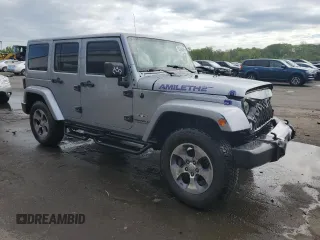 2016 Jeep Wrangler Unlimited 75th Anniversary with VIN 1C4HJWEG1GL183099, listed as a Copart auction lot 55393385 with Not provided miles and Salvage title. Bid and sale history available at DreamBid. Image 4.