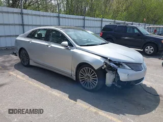 2014 Lincoln MKZ with VIN 3LN6L2JK2ER835999, listed as a IAAI auction lot 42146784 with 112,457 mi miles and . Bid and sale history available at DreamBid. Image 1.