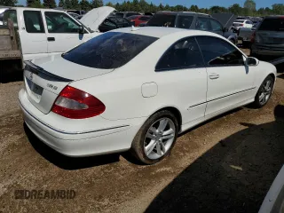 2009 Mercedes-Benz CLK-Class 3.5L with VIN WDBTJ56H09F261819, listed as a Copart auction lot 70021184 with 130,976 mi miles and Salvage Title. Bid and sale history available at carsss.com. Image 3.