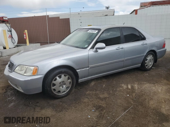 2004 Acura RL w/Navigation System z VIN JH4KA966X4C006574, wystawiony jako Copart lot #52045205 z przebiegiem 123 767 mil mil oraz Czysty tytuł • Clean title. Historia ofert i sprzedaży dostępna na DreamBid. Obrazek 1.