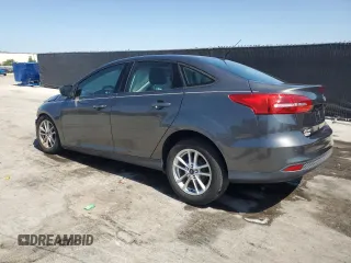 2016 Ford Focus SE with VIN 1FADP3F20GL250053, listed as a Copart auction lot 57134955 with 120,261 mi miles and Salvage title. Bid and sale history available at DreamBid. Image 2.