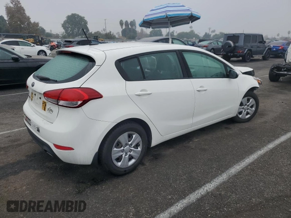 2018 Kia Forte5 LX with VIN KNAFK5A85J5773795, listed as a Copart auction lot 83042954 with 56,267 mi miles and Salvage Title. Bid and sale history available at carsss.com. Image 3.