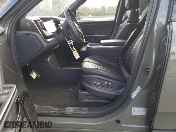 2022 Rivian R1S Launch Edition with VIN 7PDSGABL5NN001035, listed as a Copart auction lot 77188564 with Not Provided miles and Salvage Title. Bid and sale history available at carsss.com. Image 7.