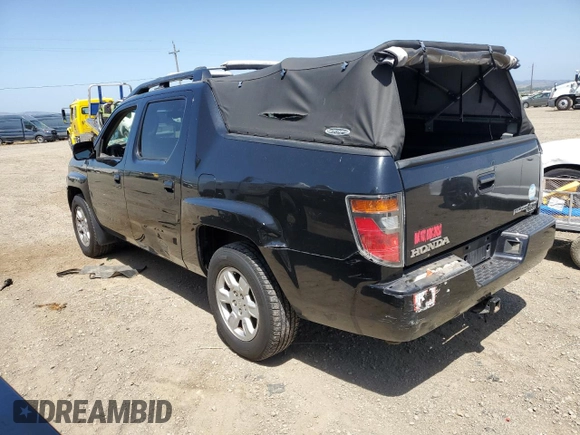 2006 Honda Ridgeline RTL with VIN 2HJYK16596H566552, listed as a Copart auction lot 57516525 with 192,023 mi miles and Salvage Title. Bid and sale history available at DreamBid. Image 2.