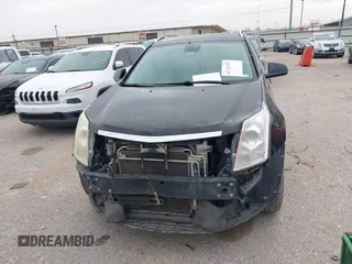 2011 Cadillac SRX Performance Collection with VIN 3GYFNBEY9BS625623, listed as a IAAI auction lot 41731357 with 163,245 mi miles. Bid and sale history available at carsss.com. Image 6.