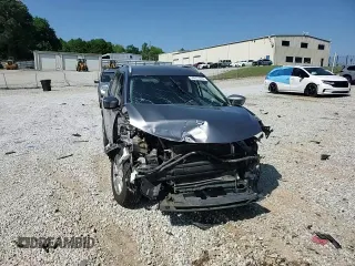 2017 Nissan Rogue SV z VIN KNMAT2MT2HP560262, wystawiony jako Copart lot #54861885 z przebiegiem 109 604 mil mil oraz Szkoda całkowita • Salvage title. Historia ofert i sprzedaży dostępna na DreamBid. Obrazek 14.
