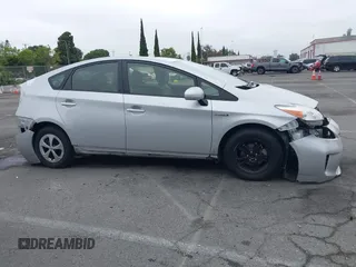 2015 Toyota Prius Four with VIN JTDKN3DU5F1931380, listed as a IAAI auction lot 42420445 with 128,596 mi miles and . Bid and sale history available at DreamBid. Image 14.