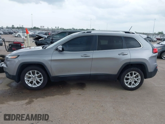 2016 Jeep Cherokee 75th Anniversary with VIN 1C4PJLCB1GW229823, listed as a IAAI auction lot 41848844 with 94,884 mi miles. Bid and sale history available at carsss.com. Image 14.