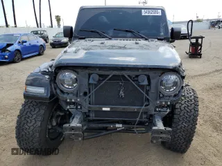 2024 Jeep Wrangler Sahara with VIN 1C4RJXP60RW116607, listed as a Copart auction lot 54562695 with 62,352 mi miles and Salvage title. Bid and sale history available at DreamBid. Image 5.