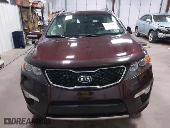 2013 Kia Sorento SX with VIN 5XYKWDA2XDG381984, listed as a IAAI auction lot 41169315 with 144,010 mi miles. Bid and sale history available at carsss.com. Image 12.