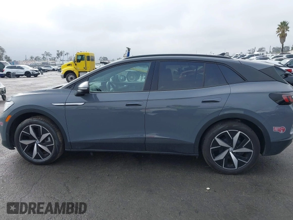 2023 Volkswagen ID.4 S z VIN 1V25MPE80PC051099, wystawiony jako IAAI lot #41332507 z przebiegiem 12 037 mil mil oraz . Historia ofert i sprzedaży dostępna na DreamBid. Obrazek 14.