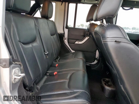 2014 Jeep Wrangler Unlimited Rubicon с VIN 1C4HJWFG3EL322449, выставлен на аукционе Copart как лот 57187665 с пробегом 122 469 миль миль и Списание • Salvage title. История ставок и продаж доступна на DreamBid. Изображение 10.