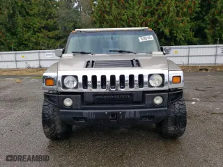 2003 Hummer H2 with VIN 5GRGN23U73H111109, listed as a Copart auction lot 76388144 with 160,179 mi miles and Salvage Title. Bid and sale history available at carsss.com. Image 5.
