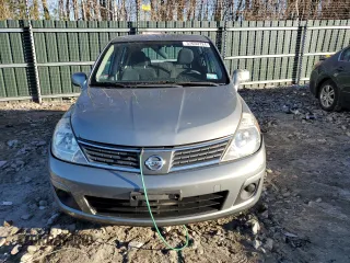 2009 Nissan Versa 1.8 S with VIN 3N1BC13E49L455983, listed as a Copart auction lot 37650724 with 166,896 mi miles and Clean Title. Bid and sale history available at carsss.com. Image 5.