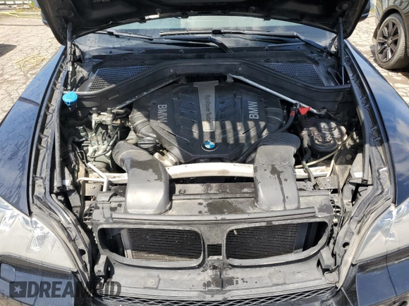 2013 BMW X5 xDrive50i with VIN 5UXZV8C56DL898864, listed as a Copart auction lot 56076705 with 157,805 mi miles and Clean title. Bid and sale history available at DreamBid. Image 12.