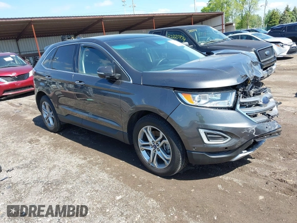 2015 Ford Edge Titanium z VIN 2FMPK4K83FBB30411, wystawiony jako IAAI lot #42230235 z przebiegiem 69 094 mil mil oraz . Historia ofert i sprzedaży dostępna na DreamBid. Obrazek 1.