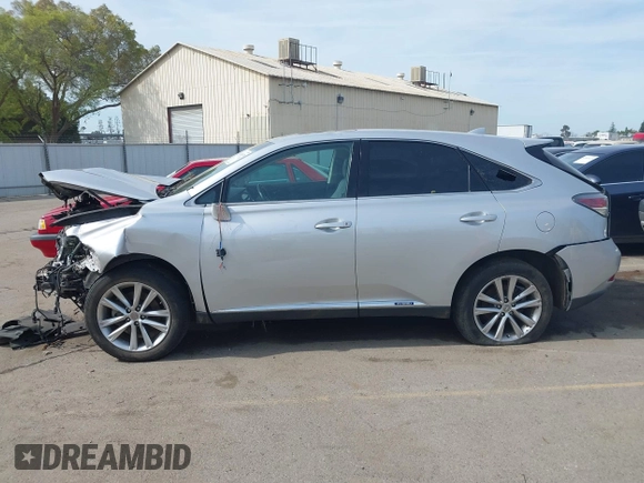2015 Lexus RX 450h with VIN 2T2ZB1BA7FC002089, listed as a IAAI auction lot 41826675 with 100,852 mi miles and . Bid and sale history available at DreamBid. Image 14.