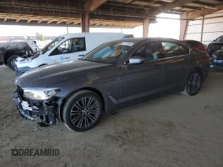2019 BMW 5 Series 530e iPerformance with VIN WBAJA9C57KB393593, listed as a Copart auction lot 42133955 with 53,771 mi miles and Salvage Title. Bid and sale history available at carsss.com. Image 1.