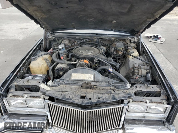 1985 Cadillac Eldorado z VIN 1G6EL578XFE640091, wystawiony jako Copart lot #71849374 z przebiegiem 30 631 mil mil oraz Szkody całkowita. Historia ofert i sprzedaży dostępna na DreamBid. Obrazek 12.