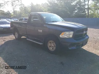 2014 Ram 1500 Tradesman z VIN 3C6JR7DG4EG324833, wystawiony jako IAAI lot #42876061 z przebiegiem 125 285 mil mil oraz . Historia ofert i sprzedaży dostępna na DreamBid. Obrazek 1.