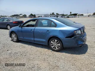 2015 Volkswagen Jetta SE with VIN 3VWD17AJ1FM421162, listed as a Copart auction lot 63873695 with 191,976 mi miles and Salvage title. Bid and sale history available at DreamBid. Image 2.
