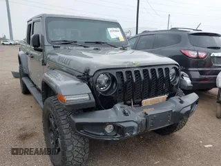 2022 Jeep Gladiator Texas Trail z VIN 1C6HJTAG2NL176011, wystawiony jako IAAI lot #42193864 z przebiegiem 27 219 mil mil oraz . Historia ofert i sprzedaży dostępna na DreamBid. Obrazek 1.