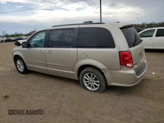 2016 Dodge Grand Caravan SXT with VIN 2C4RDGCGXGR312372, listed as a Copart auction lot 54943615 with 127,576 mi miles and Clean Title. Bid and sale history available at DreamBid. Image 2.