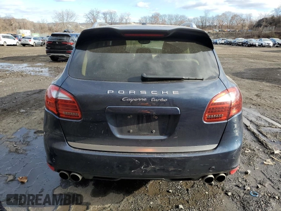 2012 Porsche Cayenne Turbo z VIN WP1AC2A29CLA83629, wystawiony jako Copart lot #83067994 z przebiegiem Nie podano mil oraz Szkoda całkowita • Salvage title. Historia ofert i sprzedaży dostępna na DreamBid. Obrazek 6.