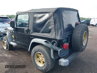 2006 Jeep Wrangler Sport z VIN 1J4FA49S06P721223, wystawiony jako IAAI lot #42654272 z przebiegiem 225 223 mil mil oraz . Historia ofert i sprzedaży dostępna na DreamBid. Obrazek 3.