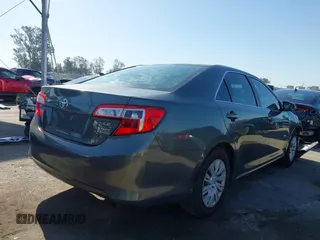 2014 Toyota Camry L with VIN 4T1BF1FK7EU731591, listed as a IAAI auction lot 41917728 with 85,504 mi miles. Bid and sale history available at carsss.com. Image 4.