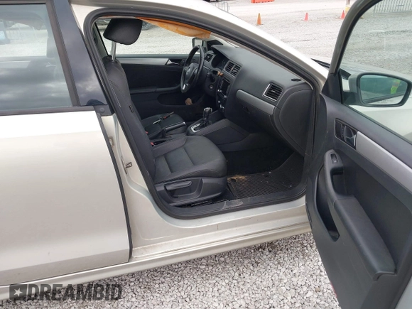 2012 Volkswagen Jetta TDI w/Premium with VIN 3VWLL7AJ2CM317216, listed as a IAAI auction lot 41731204 with 320,474 mi miles and . Bid and sale history available at DreamBid. Image 5.
