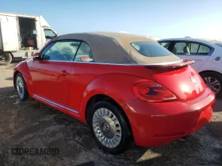 2014 Volkswagen Beetle 1.8T w/Premium z VIN 3VW517AT9EM819966, wystawiony jako Copart lot #76990014 z przebiegiem Nie podano mil oraz Nie do naprawy • Non repairable. Historia ofert i sprzedaży dostępna na DreamBid. Obrazek 2.