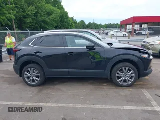 2024 Mazda CX-30 S Preferred z VIN 3MVDMBCM3RM663118, wystawiony jako IAAI lot #42336540 z przebiegiem 11 096 mil mil oraz . Historia ofert i sprzedaży dostępna na DreamBid. Obrazek 13.
