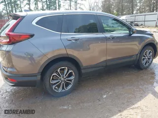 2021 Honda CR-V EX with VIN 2HKRW1H59MH404256, listed as a IAAI auction lot 41711235 with 100,389 mi miles. Bid and sale history available at carsss.com. Image 4.