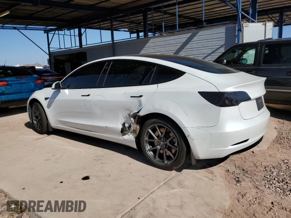 2021 Tesla Model 3 Standard Range Plus with VIN 5YJ3E1EA7MF978749, listed as a Copart auction lot 43377955 with 51,871 mi miles and Salvage Title. Bid and sale history available at carsss.com. Image 2.