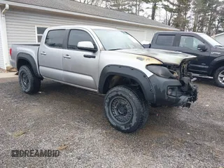 2016 Toyota Tacoma SR with VIN 5TFCZ5AN2GX012937, listed as a IAAI auction lot 41963728 with 157,397 mi miles and . Bid and sale history available at DreamBid. Image 1.